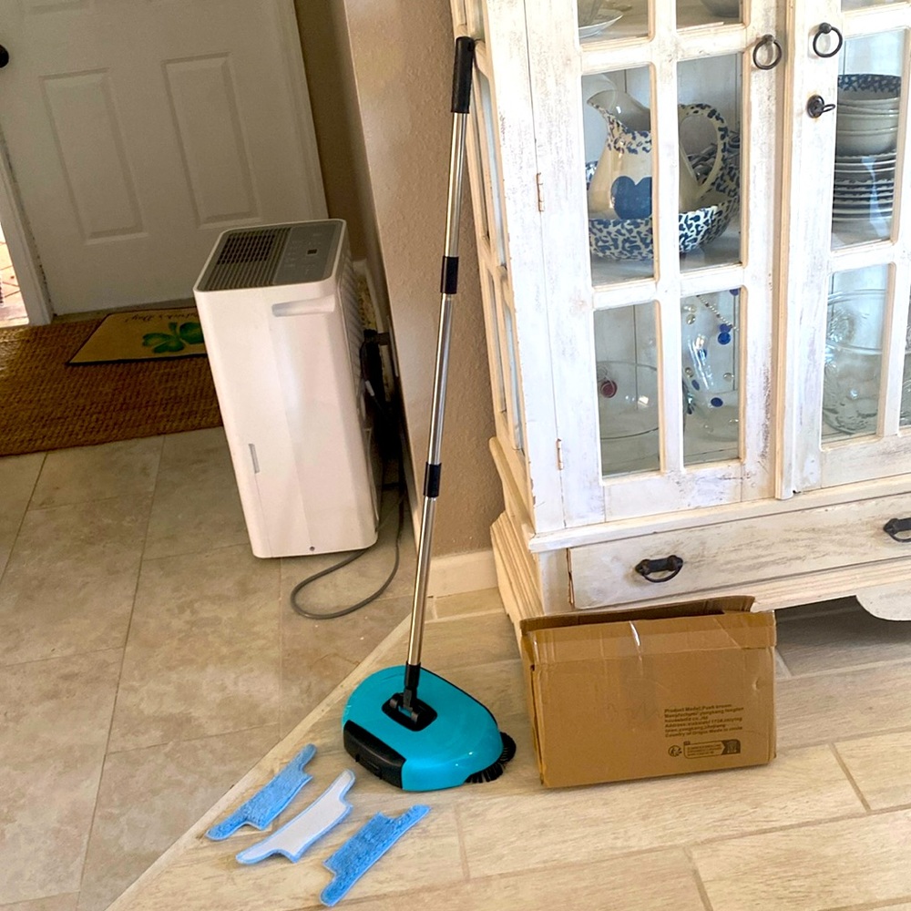 Floor Sweeper  Turqoise, unattaches to fit in box shown. 3 brushes. Almost new